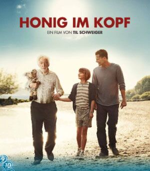 Filmplakat mit drei Menschen an einem Strand